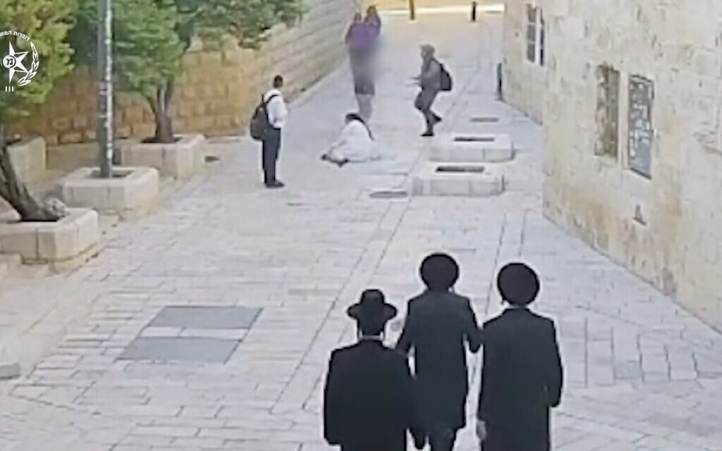 Surveillance footge shows a Catholic nun attacked on a street in Jerusalem on April 28, 2026. (Israeli Police/Screenshot)