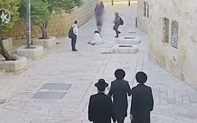 Surveillance footge shows a Catholic nun attacked on a street in Jerusalem on April 28, 2026. (Israeli Police/Screenshot)