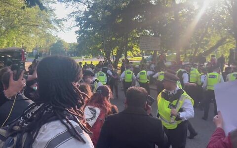 Police moving protesters outside Woolwich Crown Court who were blocking the prison van believed to be carrying the defendants from the raid on Elbit Systems from leaving. Picture date: Friday June 12, 2026. PA Photo. Photo credit should read: Tom Jeffreys/PA Wire