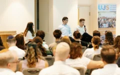 Incoming UJS president Raphi Leon (right) speaks during a discussion at the Union of Jewish Students' State of the Union event in London. Photo Credit: UJS