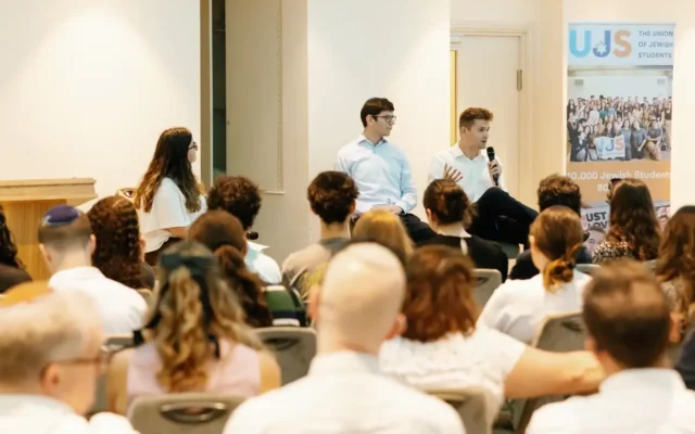Incoming UJS president Raphi Leon (right) speaks during a discussion at the Union of Jewish Students' State of the Union event in London. Photo Credit: UJS