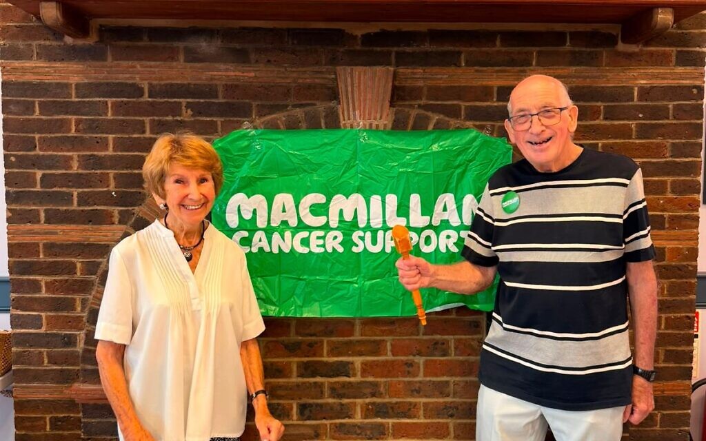 Mavis and Simon Last celebrate raising money at a Rummikub afternoon in Kenton on June 28. (March Hartog)