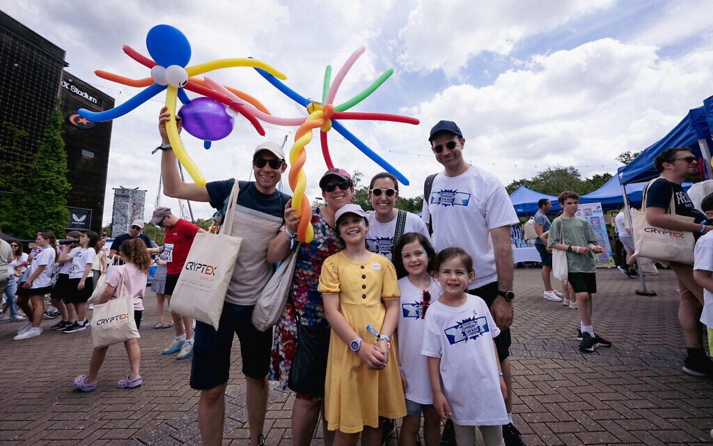 Families enjoy the festival atmosphere in the Fun Zone at the Maccabi GB Community Fun Run.