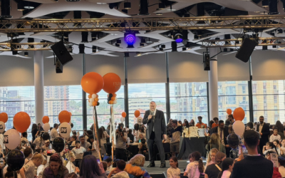 The Chief Rabbi addresses more than 1,000 pupils and teachers during Etgar 2026 at Wembley Stadium, celebrating Jewish learning and the programme's 15th anniversary. Photo: Annabel Sinclair