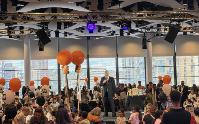 The Chief Rabbi addresses more than 1,000 pupils and teachers during Etgar 2026 at Wembley Stadium, celebrating Jewish learning and the programme's 15th anniversary. Photo: Annabel Sinclair