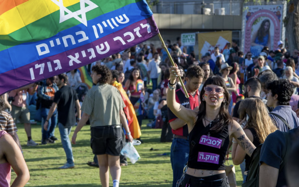 Attendees wave flags at the Jerusalem March for Pride and Tolerance, 4 June, 2026. (Theia Chatelle)