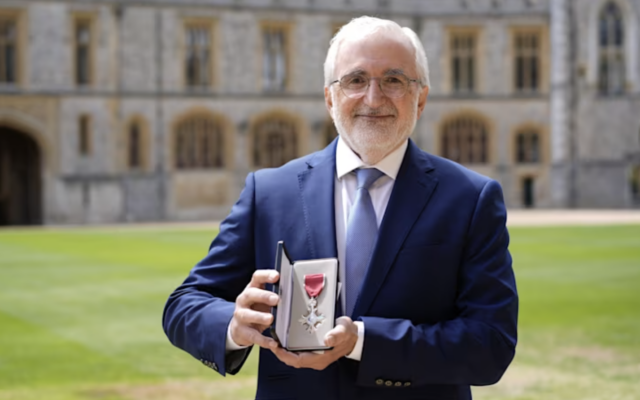 Imam Nasser Kurdy displays his MBE after receiving the honour from Princess Anne at Windsor Castle, where he was recognised for services to community interfaith reconciliation. Credit: PA Images.