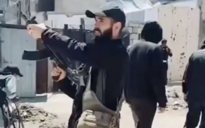 Image released by the IDF which it says shows Ahmed Wishah carrying a firearm in Gaza.
