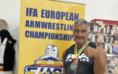 Marc Sidney with his silver medal at the IFA European Arm Wrestling Championships in Codlea, Romania.