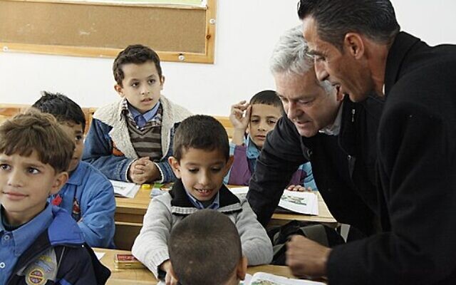 Palestinian pupils attend a classroom at a UNRWA school in Gaza. A new IMPACT-se report alleges antisemitic and extremist teaching materials remain in use in some UNRWA schools. Photo: Wikipedia