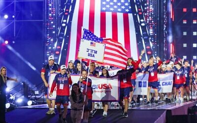 The USA delegation parades at the opening ceremony of the 22nd Maccabiah Games at Teddy Stadium in Jerusalem, July 1, 2026. (Danny Maron/Flash90)