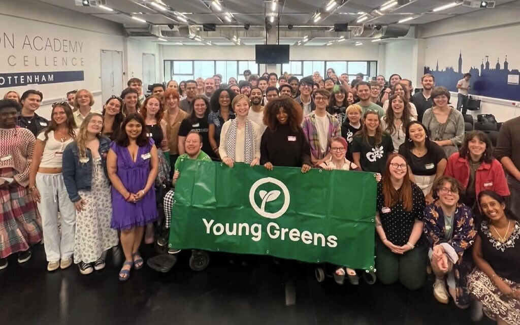 Jo Dowbor (centre left) and Mothin Ali (centre right) with Young Greens members at the party's national convention, where delegates elected new co-chairs and voted to replace the IHRA definition of antisemitism. Photo" Instagram