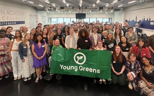 Jo Dowbor (centre left) and Mothin Ali (centre right) with Young Greens members at the party's national convention, where delegates elected new co-chairs and voted to replace the IHRA definition of antisemitism. Photo" Instagram