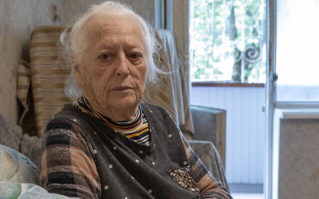 A member of Kyiv's Jewish community, whose home was damaged in a Russian attack in May. Photo: WJR