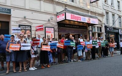 Our Fight supporters gather outside the Harold Pinter Theatre before the West End opening of Allegra in support of Dame Maureen Lipman. Photo Credit: Braham Cohen