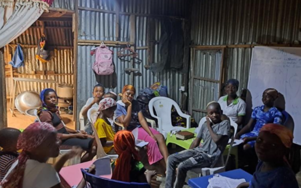David from Nigeria, teaching a Hebrew lesson to the Jewish youth in Nigeria.