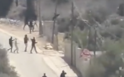 Palestinians and armed Israeli civilians during the confrontation near Tel in Samaria. Photo: X