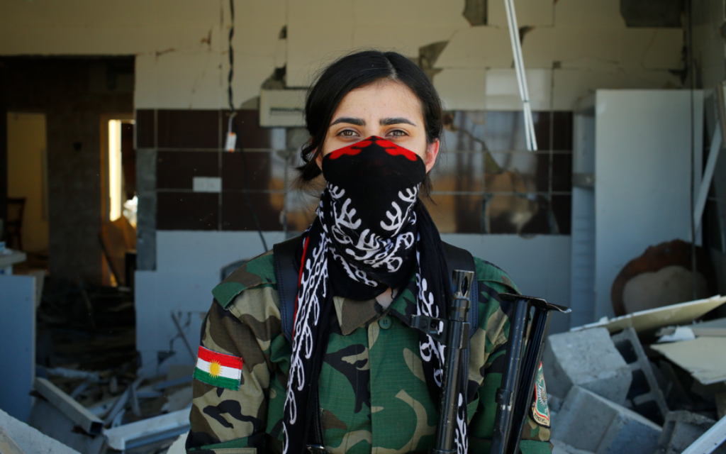 An Iranian Kurdish peshmerga fighter - Donald Trump's 'Iran Deal' had immediate ramifications for their position, with the regime launching strikes against them (Photo: David Patrikakrakos)