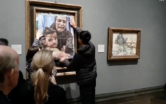 Youth Demand activists cover Pablo Picasso's Motherhood with an image of a mother and child from Gaza during their protest at the National Gallery.

Photo Credit: X / Youth Demand