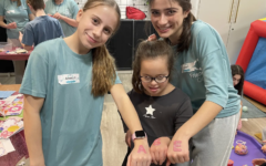 Friendship Circle Herts teenage volunteers with a young participant during a SENsory Sunday session in Borehamwood.