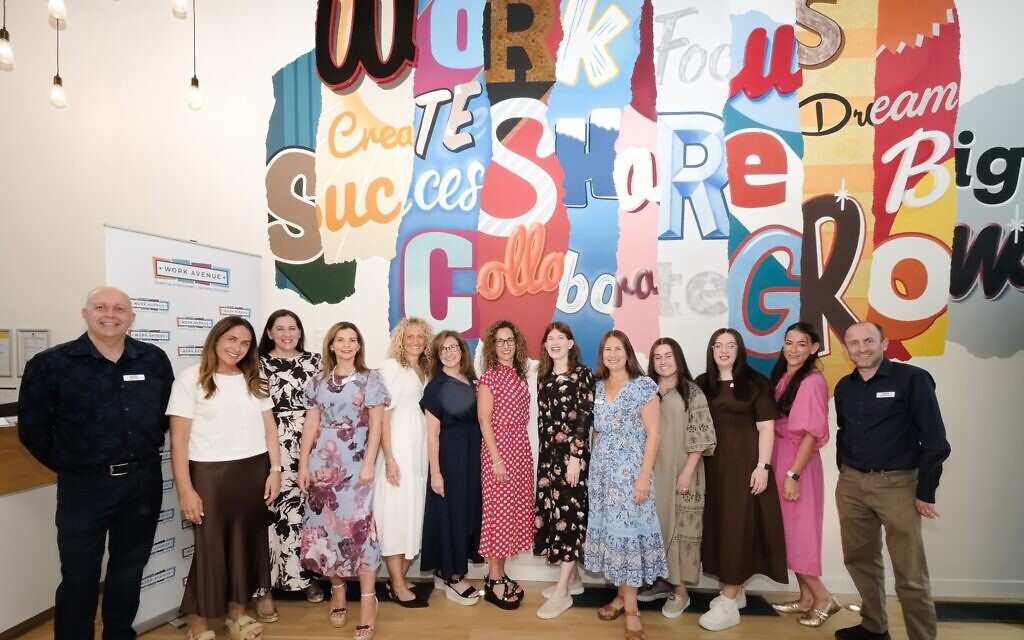The Work Avenue team celebrates the charity's 20th anniversary at the Wohl Enterprise Hub in Finchley.
