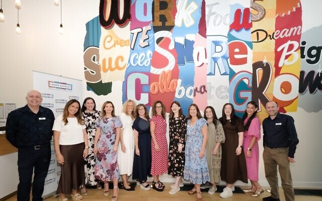The Work Avenue team celebrates the charity's 20th anniversary at the Wohl Enterprise Hub in Finchley.
