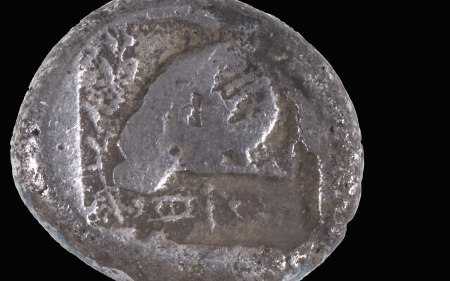 The rare 2,500-year-old Persian-period coin discovered on Ashdod beach, believed to be the first of its type found in Israel. Photo Credit: Shay Halevi/Israel Antiquities Authority
