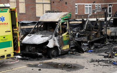 File photo of the burnt out remains of Hatzola ambulances at the Jewish Community Ambulance service in in Golders Green, London