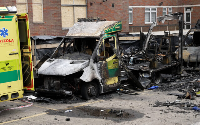 File photo of the burnt out remains of Hatzola ambulances at the Jewish Community Ambulance service in in Golders Green, London