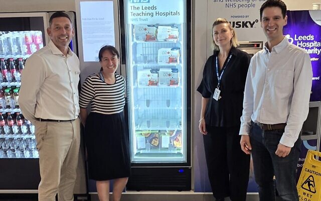 Left to right: Craig Richardson, Director of Estates & Facilities & Deputy Chief Executive Leeds Teaching Hospitals NHS Trust; Dr Wilder, chair of the Leeds Teaching Hospitals Trust Jewish Network; Suzanne Dunkley, Chief People Officer, Leeds Teaching Hospital; Rabbi Alby Chait, Jewish chaplain at Leeds Teaching Hospital, all standing by the newly installed kosher food vending machine. August 9th 2026. Pic: Courtesy
