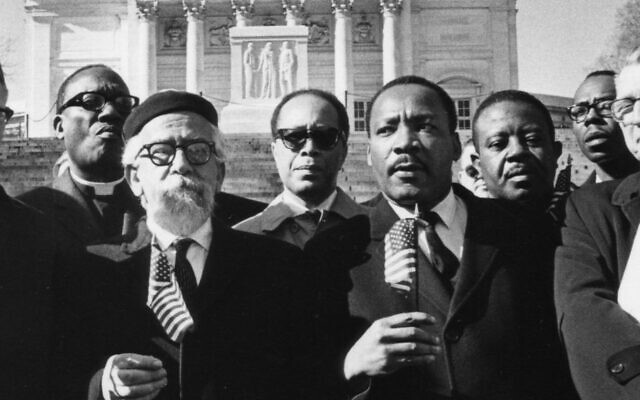 Rabbi Abraham Joshua Heschel with Martin Luther King in Montgomery, Alabama on March 25 1965 at the end of the third and final Selma March for voting rights.