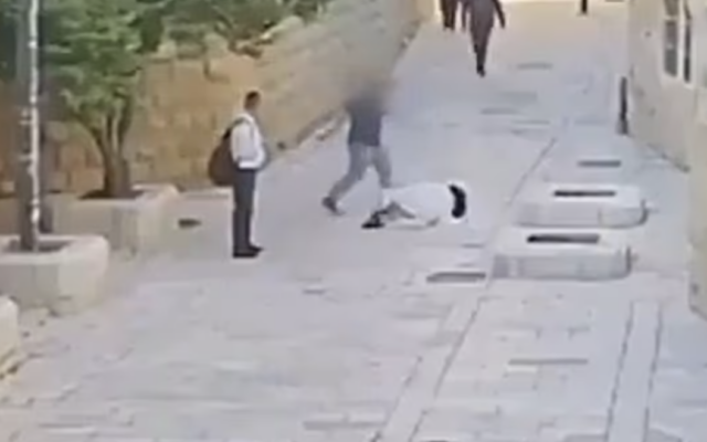 CCTV footage shows the attack on a Catholic nun on Mount Zion in Jerusalem in April. Photo Credit: Israel Police