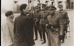 Jurgen Stroop interrogates two captured Jews Jurgen Stroop interrogates two captured Jews