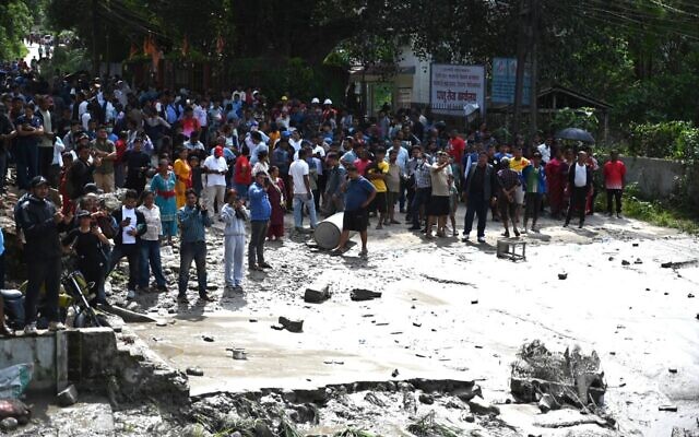 Floodwaters surge through the Nepal-Tibet border region following the catastrophic flash floods. Photo Credit: WJR