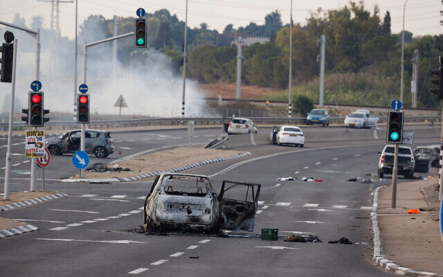 Sderot, Israel, 7 October 2023. Cars of attack victims on route 34 at the junction of Sha'ar HaNegev. Photo: Ziv Koren/Polaris