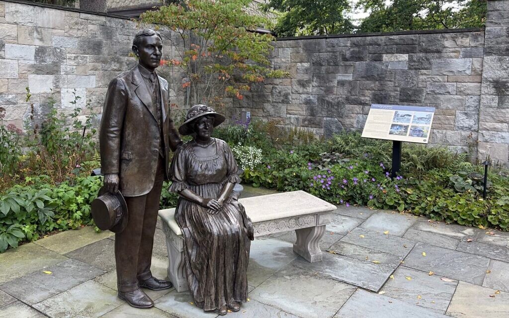 Statues of Henry and Clara Ford look over the garden at their historic Fair Lane home in Dearborn, Michigan, Sept. 2, 2026. (Andrew Lapin/JTA)