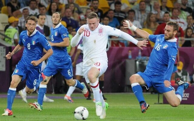 Wayne Rooney in action for England at Euro 2012, where he was among players who visited Auschwitz after hearing Zigi Shipper’s testimony. (Credit: Wikimedia Commons)