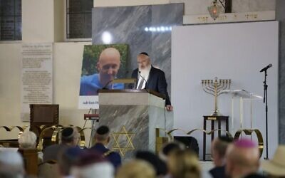 Bereaved relatives and survivors stood alongside worshippers, Jewish community leaders, politicians, police chiefs and civic figures at the same synagogue where terrorist Jihad Al-Shamie struck on the holiest day of the Jewish calendar.