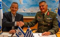Maj. Gen. Amir Baram, director-general of Israel's Defense Ministry, and Maj. Gen. Ioannis Bouras of Greece sign major defense export arms deal between their two countries. (Israel Defense Ministry) Maj. Gen. Amir Baram, director-general of Israel's Defense Ministry, and Maj. Gen. Ioannis Bouras of Greece sign major defense export arms deal between their two countries. (Israel Defense Ministry)