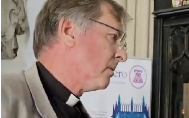 Canon Paul Maybury, Rector of Leeds Minster, during an exchange over the Stitch Their Names Together Gaza exhibition. Credit: Stop the Hate Leeds / X
