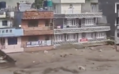 Floodwaters surge through a town in Nepal following days of extreme weather. Photo via X