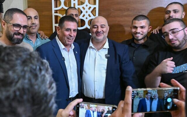 Head of Ra'am Mansour Abbas (right) holds a joint press conference with new party member Yoav Segalovitz (left) in Nazareth. August 31, 2026. (Michael Giladi/FLASH90)