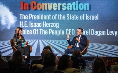 Israeli President Isaac Herzog speaks with Voice of the People CEO Ayelet Dayan Levy during an on-stage discussion. Photo Credit: Máté Fülöp