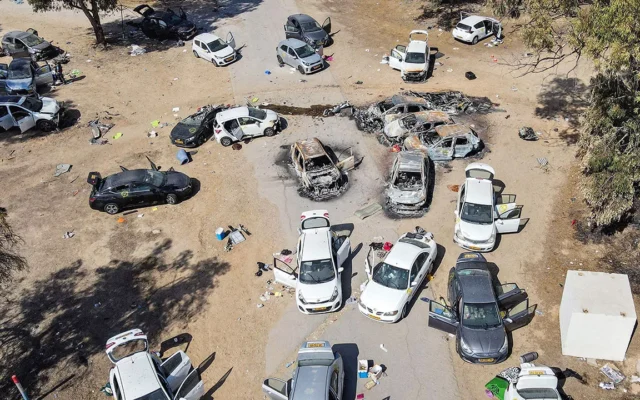Burnt out cars at the entrance to Nova Festival, 7 October 2023