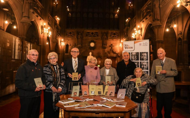 Image: Storytellers see their paperback books for the first time at the My Voice Kristallnacht event at John Rylands Institute and Library