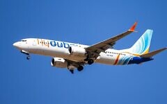 A flydubai passenger plane flies over Ben Gurion International Airport, central Israel, September 9, 2026. (Yossi Aloni/Flash90) A flydubai passenger plane flies over Ben Gurion International Airport, central Israel, September 9, 2026. (Yossi Aloni/Flash90)