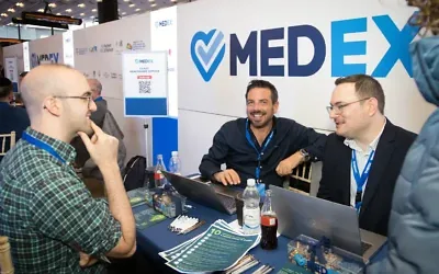 Prospective immigrants meet healthcare representatives at the MedEx UK event to discuss medical careers in Israel. Photo Credit: Meron Persey Photography.